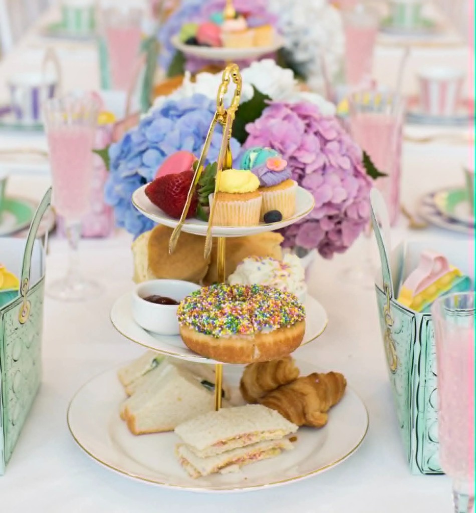 Artisan high tea with tiered treats and pastel table styling